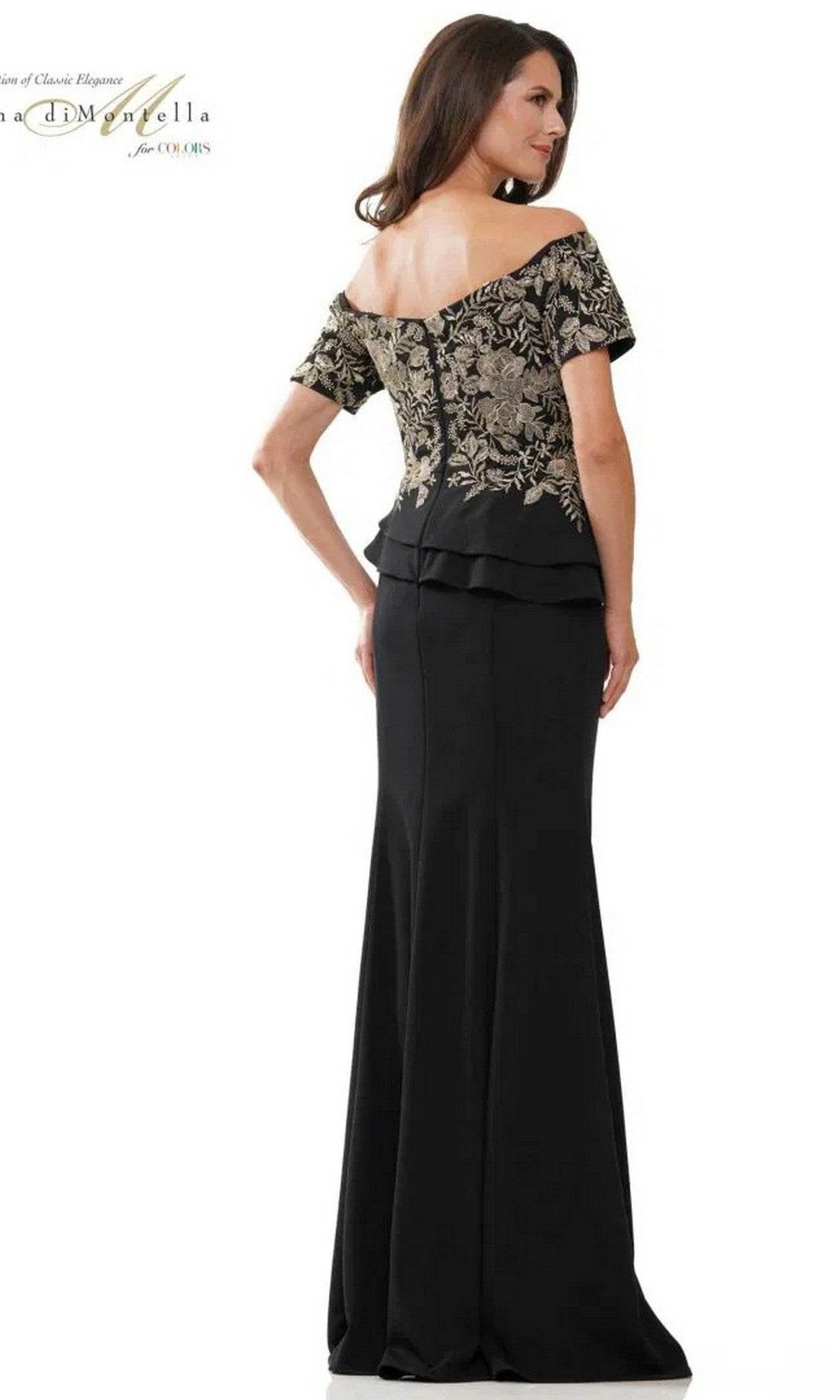 A woman is shown from the back wearing the Rina Di Montella RD2918, a floor-length black formal dress with an off-shoulder, gold-floral embroidered bodice.